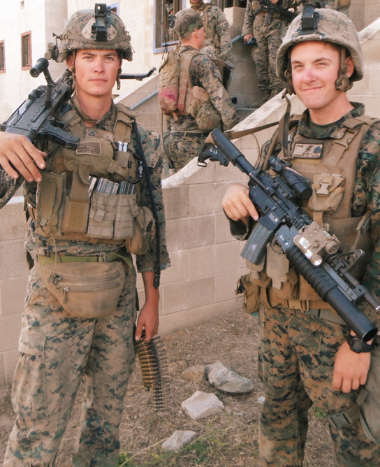 Two US Marines stand, ready to defend